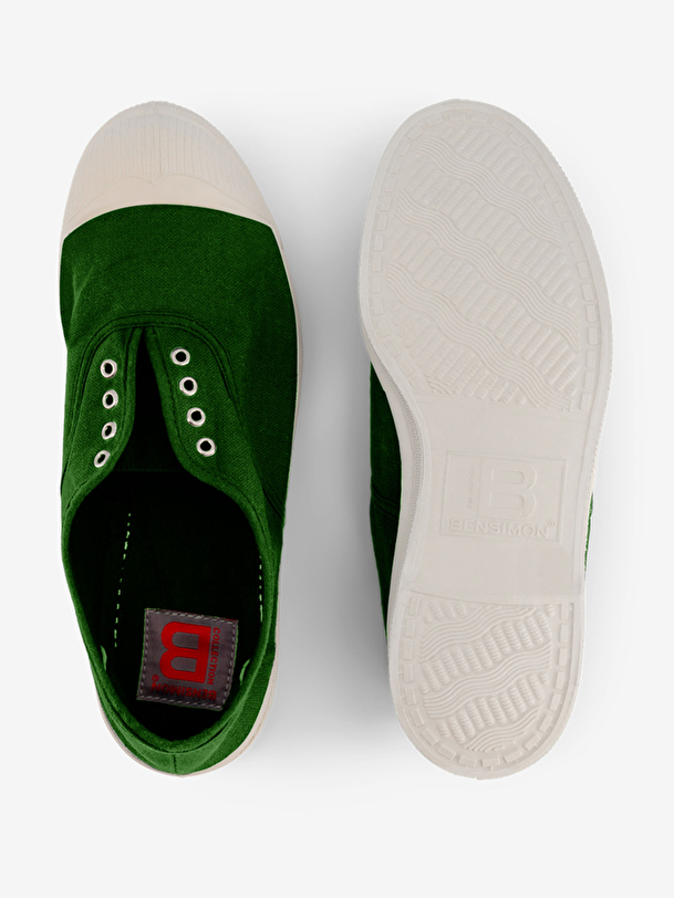 elly woman prairie green